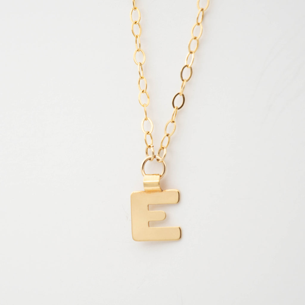 Gold initial necklace letter E