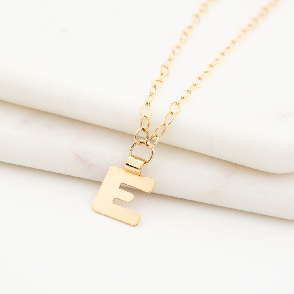 Gold initial necklace letter E