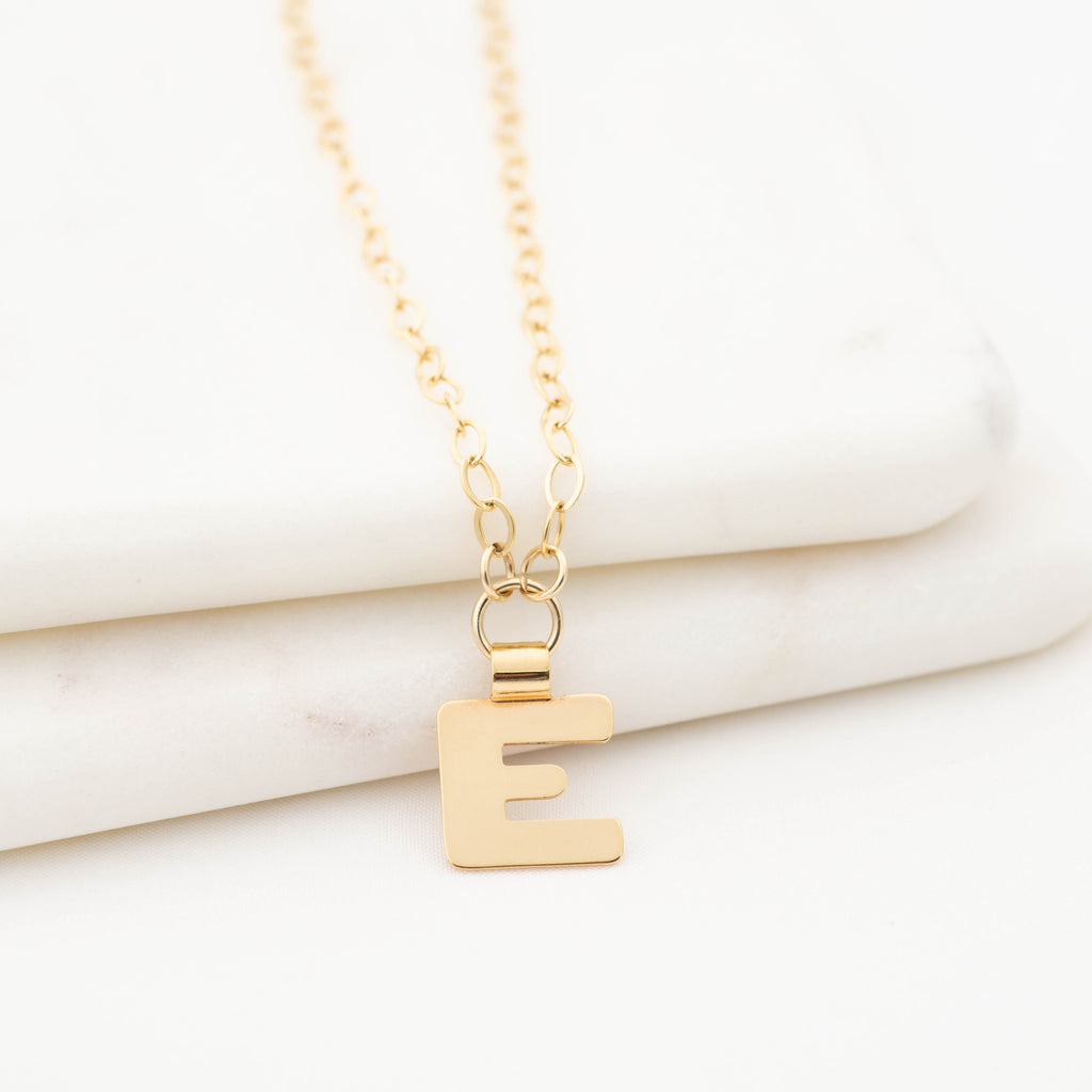 Gold initial necklace letter E