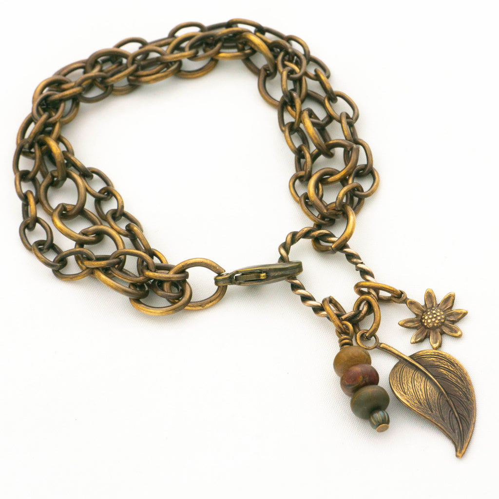 Brass chunky chain bracelet with gemstone charm, sunflower charm, and leaf charm