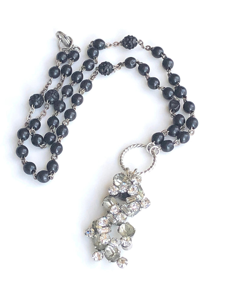 Black rosary necklace with rhinestone pendant